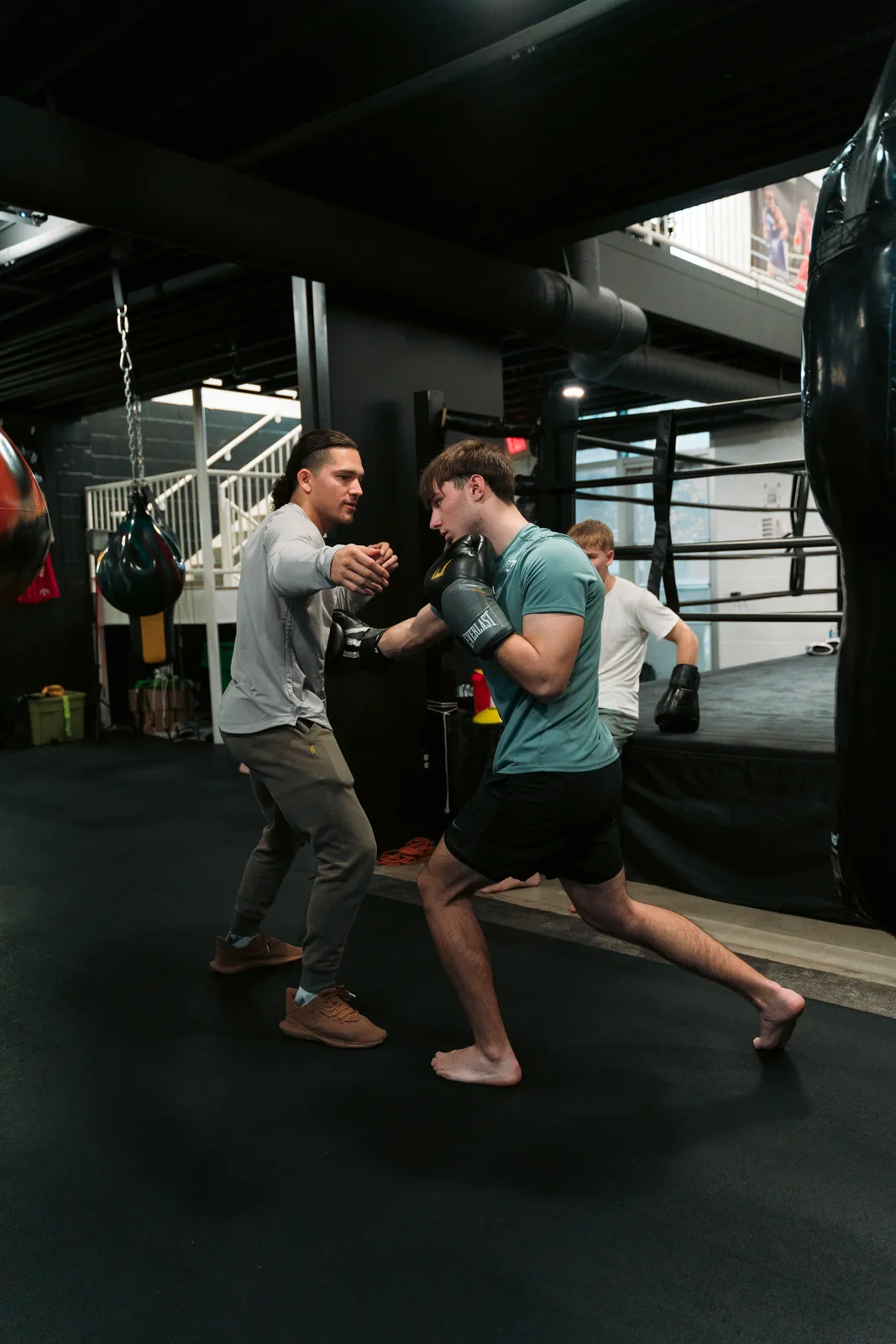 Max Metzgar coaching a student through a technique at Mad Max's Academy in Columbus, Ohio